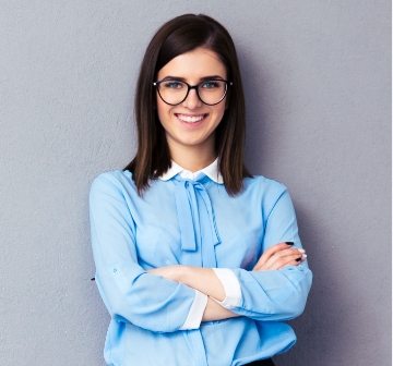 demo-attachment-1108-cheerful-young-businesswoman-standing-near-P5A34JE